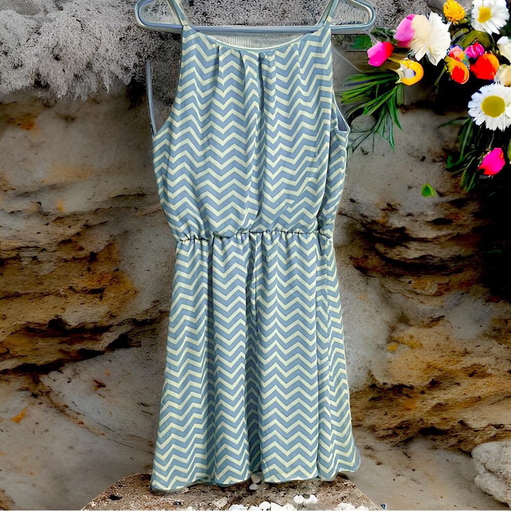 Short and flirty, turquoise chevron patterned dress.